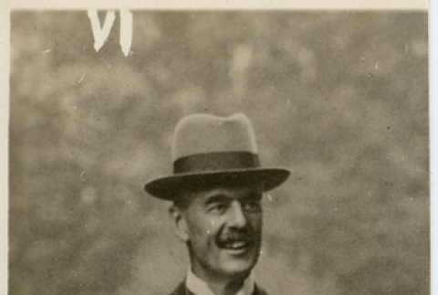 Neville Chamberlain walking with an umbrella (ddr-njpa-1-24)