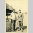 Two soldiers at a train station (ddr-densho-22-376)