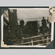 Men sitting on shipdeck (ddr-densho-540-89)