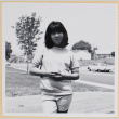 Girl standing in driveway (ddr-densho-522-111)