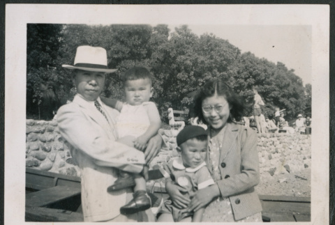 Photo of a family of four (ddr-densho-483-803)
