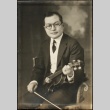 Issei minister with violin (ddr-densho-259-147)