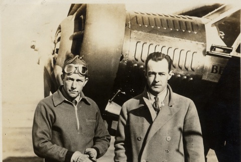Hugh Herndon, Jr. and Clyde E. Pangborn standing in front of a plane (ddr-njpa-1-1345)