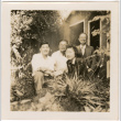 Martha (Nozawa) Tsuchida Suzuki and three unidentified men in garden (ddr-densho-426-2115)