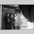 Tomoye (Nozawa) Takahashi with two unidentified woman outside house (ddr-densho-426-2346)