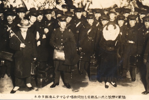 Opera singer posing with Japanese soldiers (ddr-njpa-4-1359)
