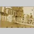 Naval officers walking up a gangplank to board a ship (ddr-njpa-13-1174)