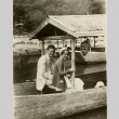 Charles and Anne Lindbergh sitting in a boat (ddr-njpa-1-1173)