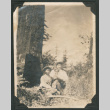 Photo of a family of three (ddr-densho-483-247)