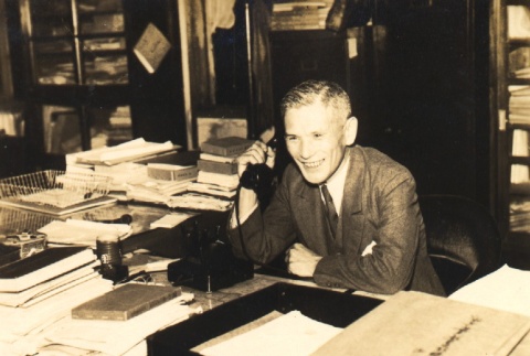 Man speaking on a telephone (ddr-njpa-4-2856)