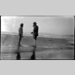 Two men stand on the beach (ddr-densho-480-6)