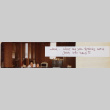Two people behind desk (ddr-densho-426-1265)