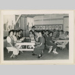 Adult education group seated in art room (ddr-densho-37-974)