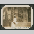 woman sitting on ledge (ddr-densho-378-570)