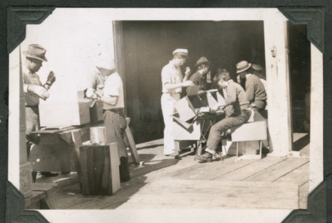 Men assembling boxes at cannery (ddr-densho-540-82)