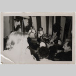 Man and woman doing cooking demonstration (ddr-densho-426-853)