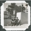 Two men sitting outside of the Japan Pavilion at the Golden Gate International Exposition (ddr-densho-300-210)
