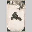 Two men sitting in snow (ddr-densho-383-172)