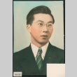 Colorized portrait of man in suit (ddr-densho-522-653)