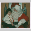 Kellie Dawn Isoshima with Santa Claus (ddr-densho-477-475)