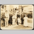 Japanese American family in front of their home (ddr-densho-259-387)