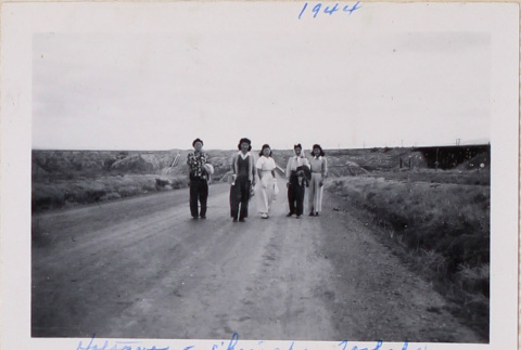 Five women walking on road (ddr-densho-464-72)