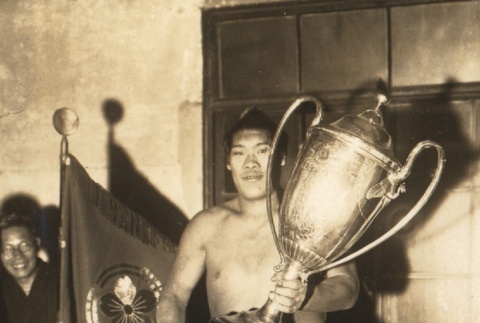 Minanogawa Tozo posing with a trophy (ddr-njpa-4-955)