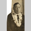 Man wearing leis (ddr-njpa-4-207)
