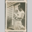 A man holding a baby (ddr-densho-321-1033)