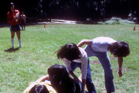 Campers playing a team geta race (ddr-densho-336-1290)