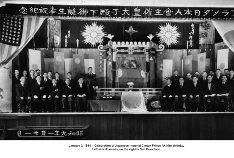 Men posing on Temple stage for celebration of Crown Prince Akihito's birthday (ddr-ajah-3-231)
