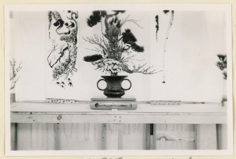 Floral arrangement on a table (ddr-densho-37-1887)