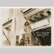 Two women on ladder with large flag (ddr-densho-426-2094)
