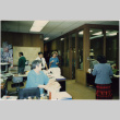 Group standing in office (ddr-densho-426-386)