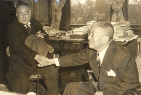 Two men shaking hand (ddr-njpa-4-86)
