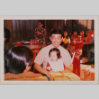 Man and toddler seated at a table (ddr-densho-426-1226)