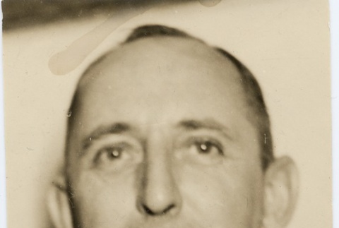 A man wearing leis (ddr-njpa-1-1374)