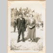 Photo of man and woman standing in field (ddr-densho-341-75)