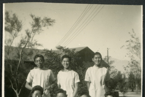 Photograph of hospital staff in front of the Manzanar hospital (ddr-csujad-47-206)