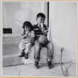 Susan and William Shiomi eating a popsicle (ddr-densho-522-274)