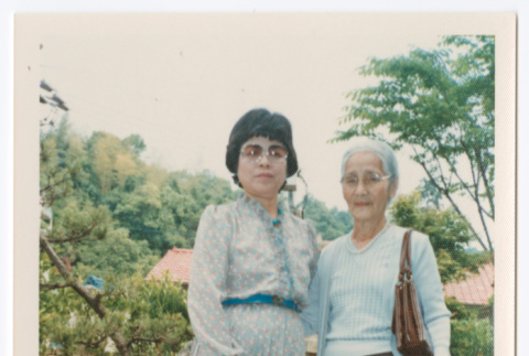 Mitsuye Yabe and Friend in Garden (ddr-ohs-1-199)
