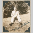 Theodore Backstrom sitting on lawn (ddr-densho-383-13)