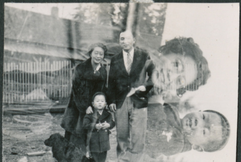 Family picture exposed over photo of mother holding child (ddr-densho-523-73)