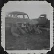 Farmers resting against a car (ddr-densho-300-498)