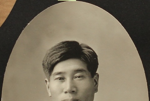 Portrait of Nikkei man in a suit (ddr-densho-259-442)