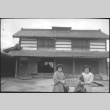 Tomoye (Nozawa)  Takahashi and Martha (Nozawa) Tsuchida Suzuki outside house (ddr-densho-426-2318)
