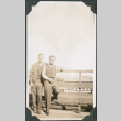 Two men leaning on railing (ddr-ajah-2-720)