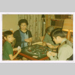 Isoshima family playing tripoley (ddr-densho-477-387)