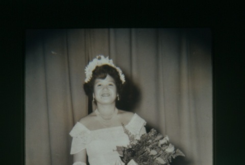 (Slide) - Image of woman in white dress with flowers. (ddr-densho-330-130-master-7d5204f6c0)