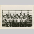 Basketball team seated on bleachers (ddr-densho-37-1024)